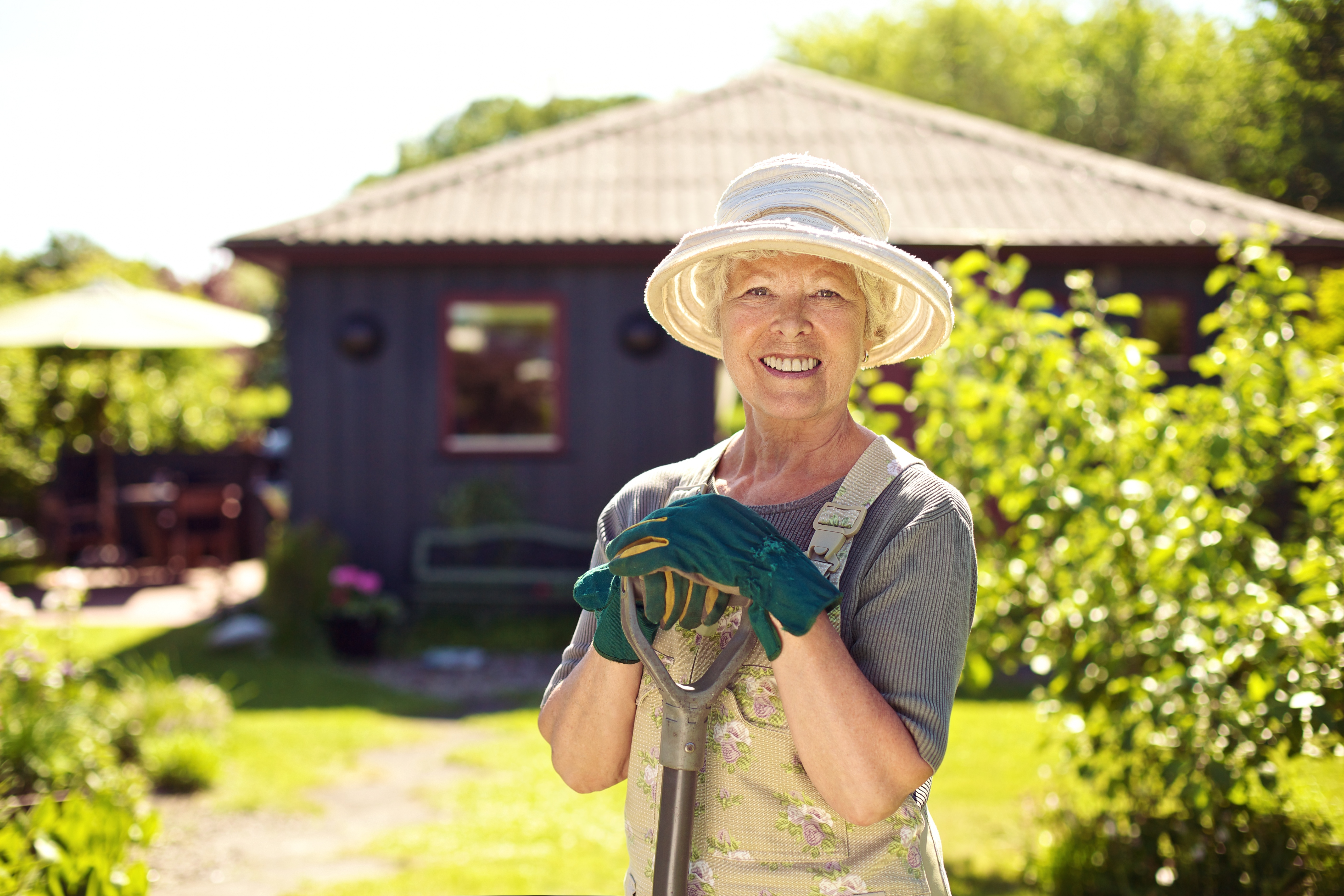 happy older lady gardener