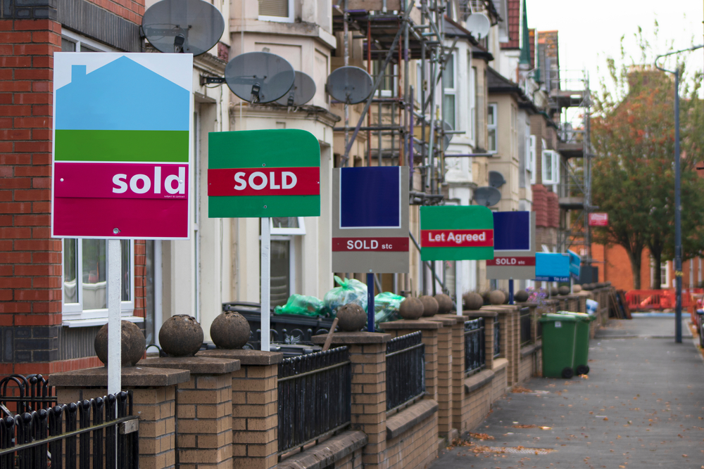 an image of houses for sale to denote a story about demand from buyers